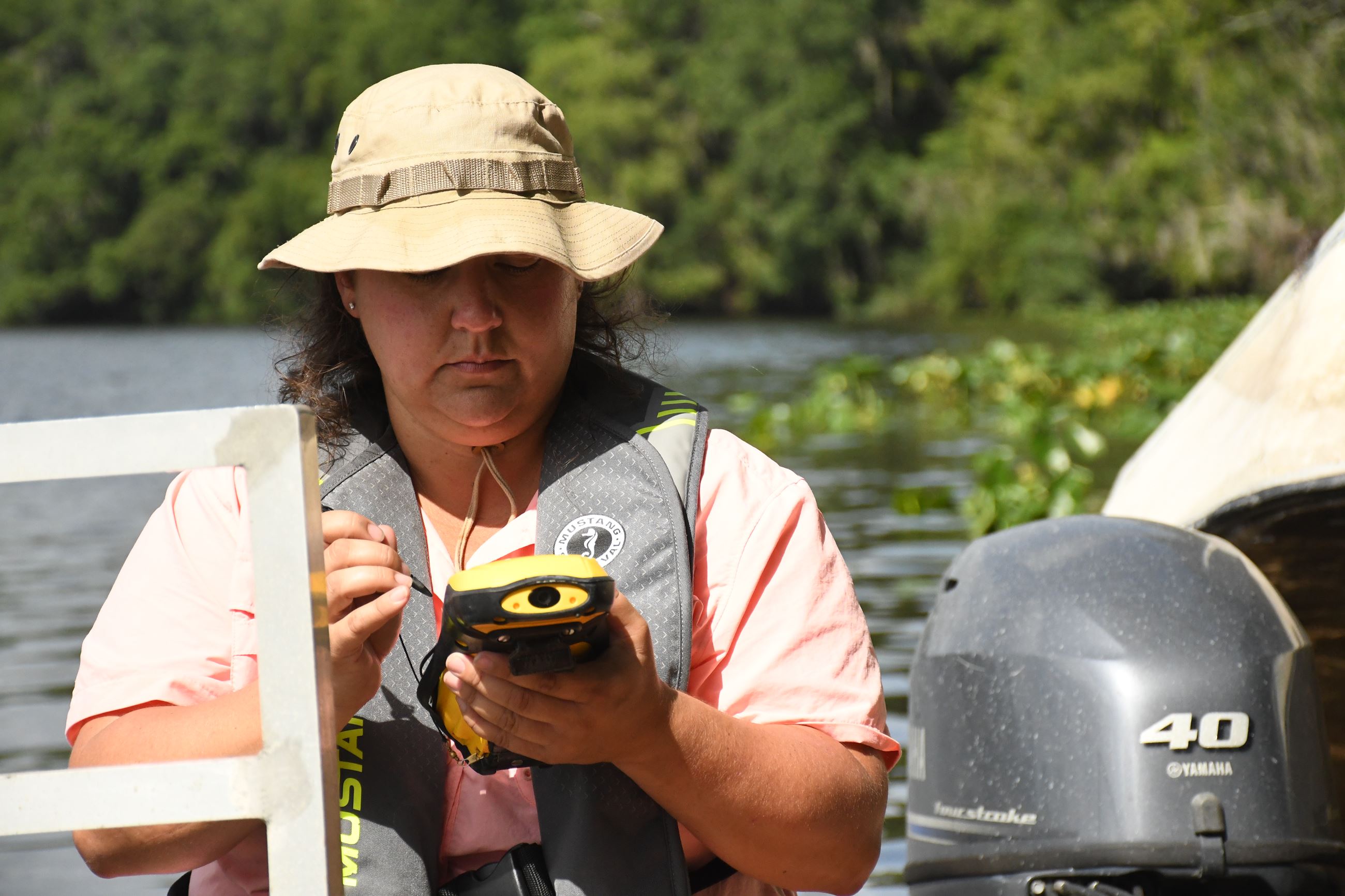 District staff plots coordinates for unsecured structures on the Suwannee River.
